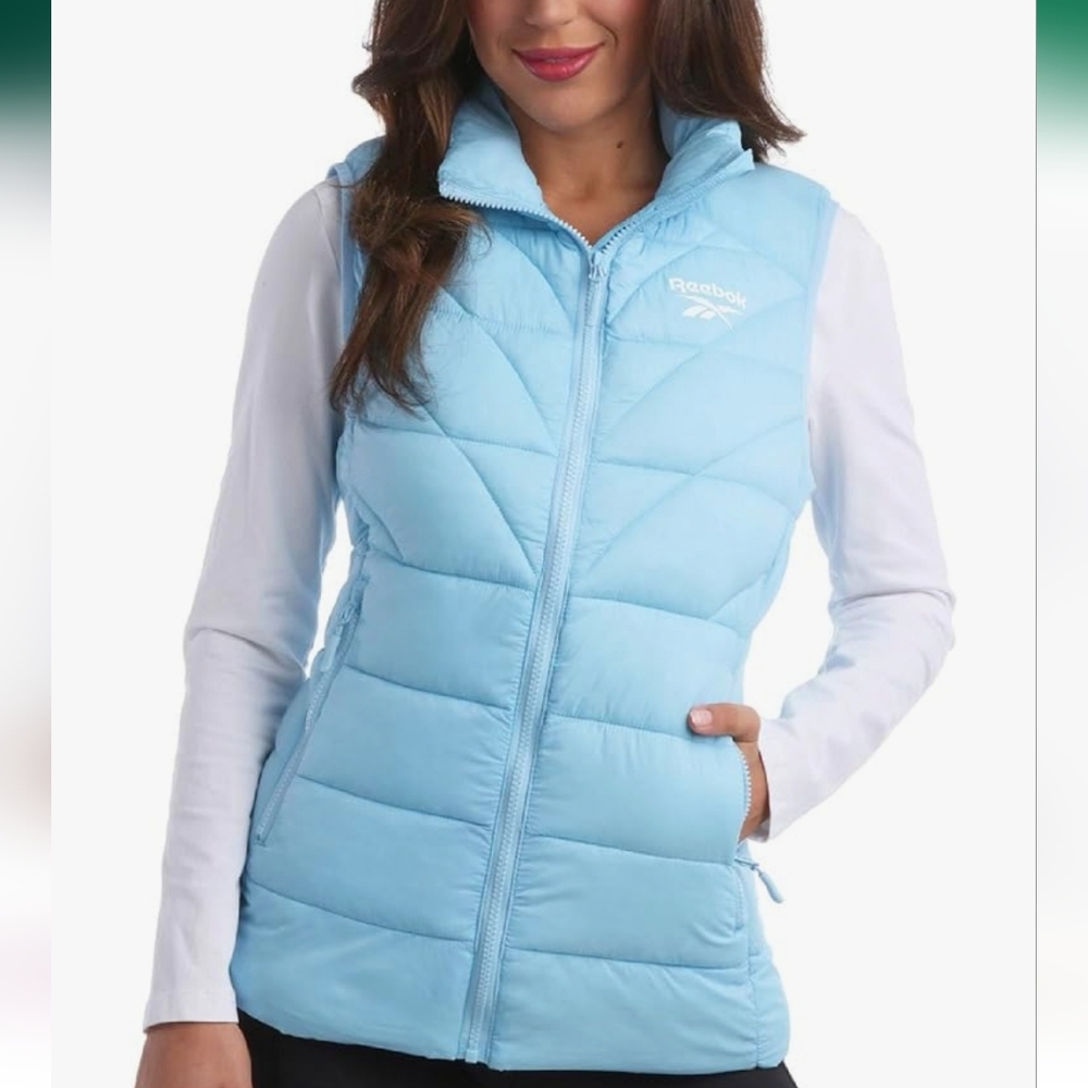 Reebok puffer vest  baby blue size l new